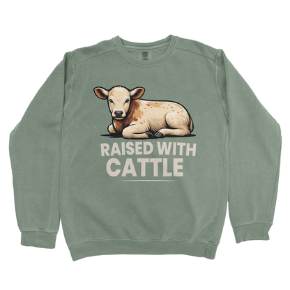 RAISED WITH CATTLE PREMIUM SWEATSHIRT
